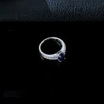 side angle view lab grown oval blue sapphire pave ring S925 sterling silver band detail