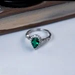 side view lab grown emerald green pear diamond halo ring S925 sterling silver band profile