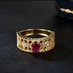 close up detail of lab grown ruby bow filigree ring S925 sterling silver lace pattern