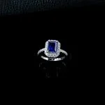 wearing lab grown square halo blue diamond ring S925 sterling silver on hand model