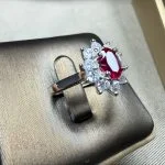 lab grown pigeon blood ruby Diana halo ring S925 sterling silver worn on hand finger oval cut red gemstone round diamond cluster halo adjustable band