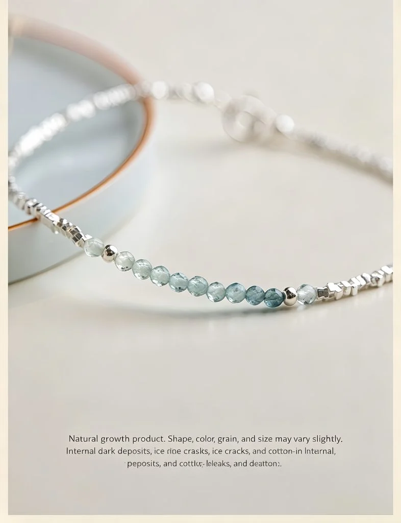 Close‑up view of faceted natural gradient blue‑green tourmaline beads and polished 925 sterling silver chip fragments