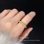 Vintage gold ring worn on finger, medieval style CZ statement ring close-up