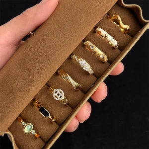 8-piece vintage gold ring set displayed in brown gift box, medieval style stackable CZ rings