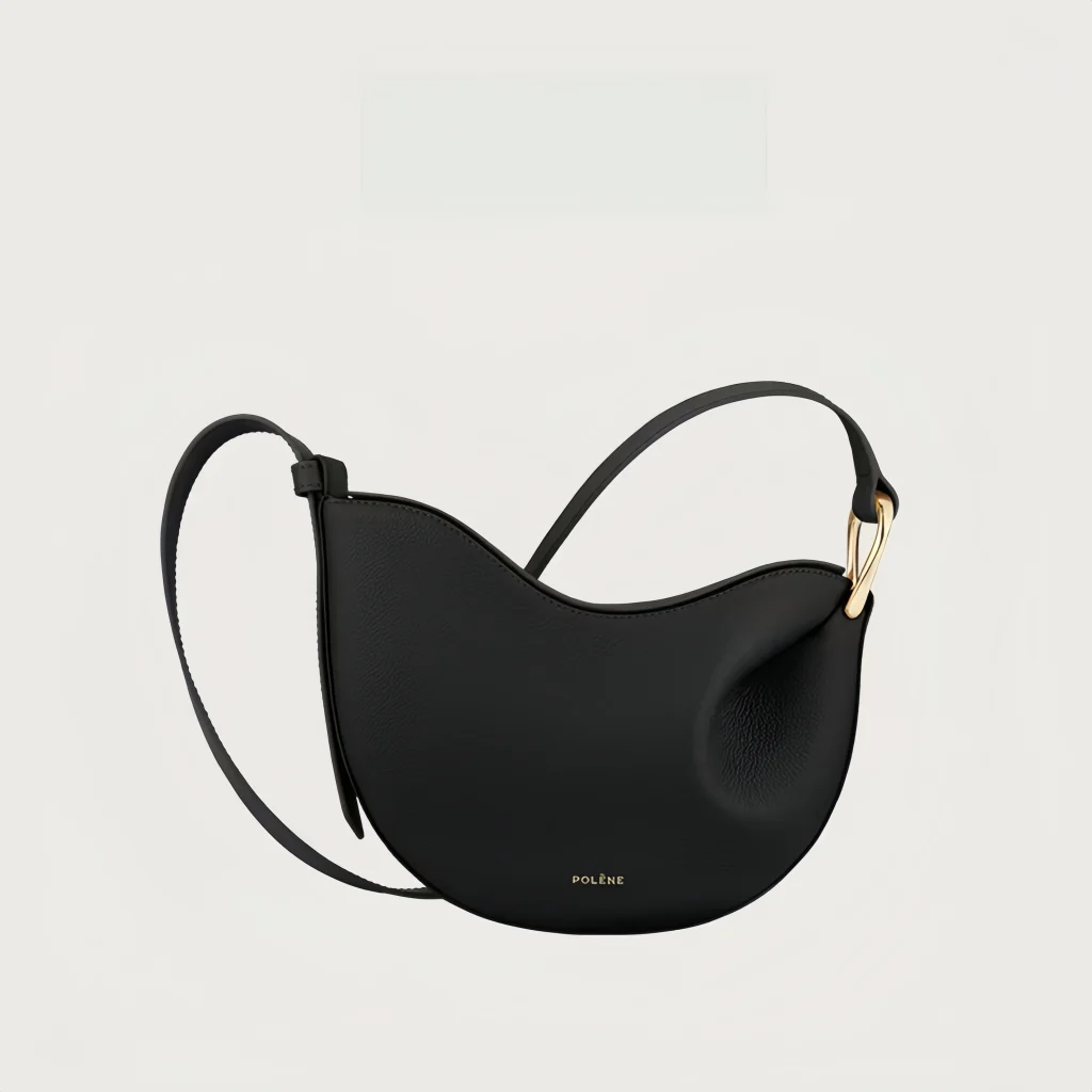 Alt Text: Women's pea shaped litchi grain cowhide hobo crossbody bag available in 5 colors: white, dark brown, black and taupe