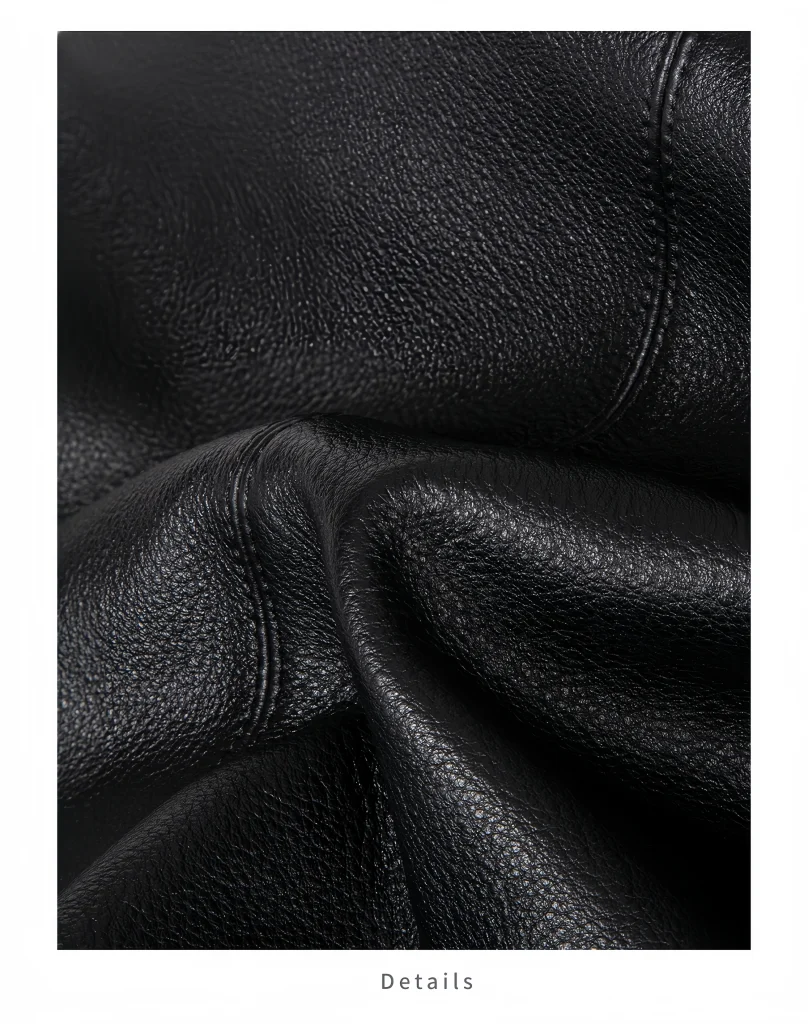 Close‑up texture shot of soft genuine top‑grain cowhide leather for oversized bucket hobo bag