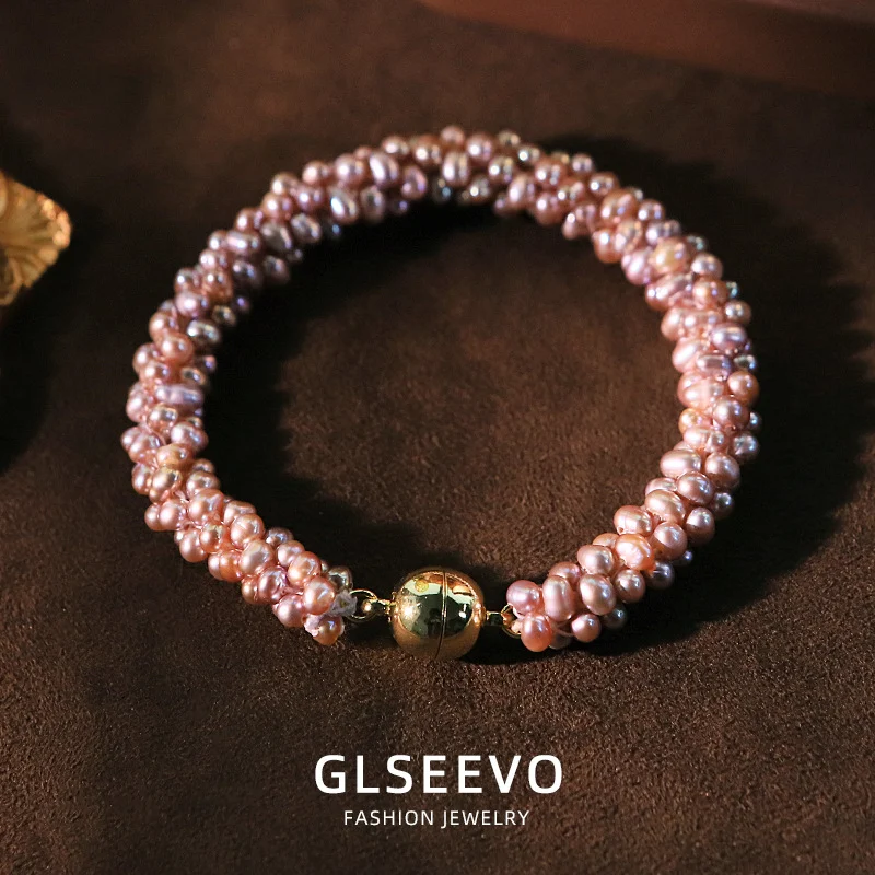 Macro close-up view showcasing the luster, texture and natural surface details of twisted purple freshwater pearls for handmade jewelry set
