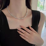 Elegant Double‑Layer Broken Silver Pearl Clavicle Necklace Women Model Wearing With Black Sleeveless Top
