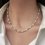 Model wearing natural freshwater pearl turquoise beaded clavicle chain new chinese style women necklace