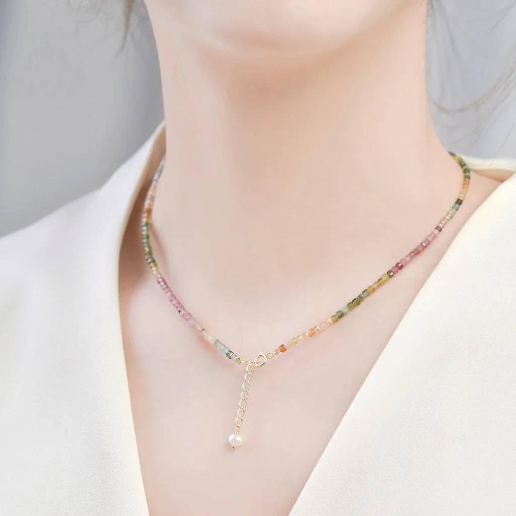 Woman model wearing dainty rainbow tourmaline cube choker collarbone necklace