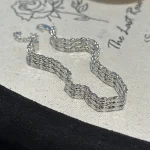 S999 fine silver three‑row rhombus woven bracelet flat lay shot, medieval vintage handcrafted women jewelry