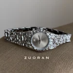 Bee Sister textured silver women watch flat lay, full view of hammered metal bracelet and case