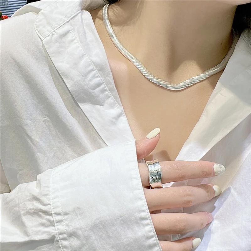 S925 silver flat snake chain choker worn on collarbone with white loose shirt, minimalist everyday necklace