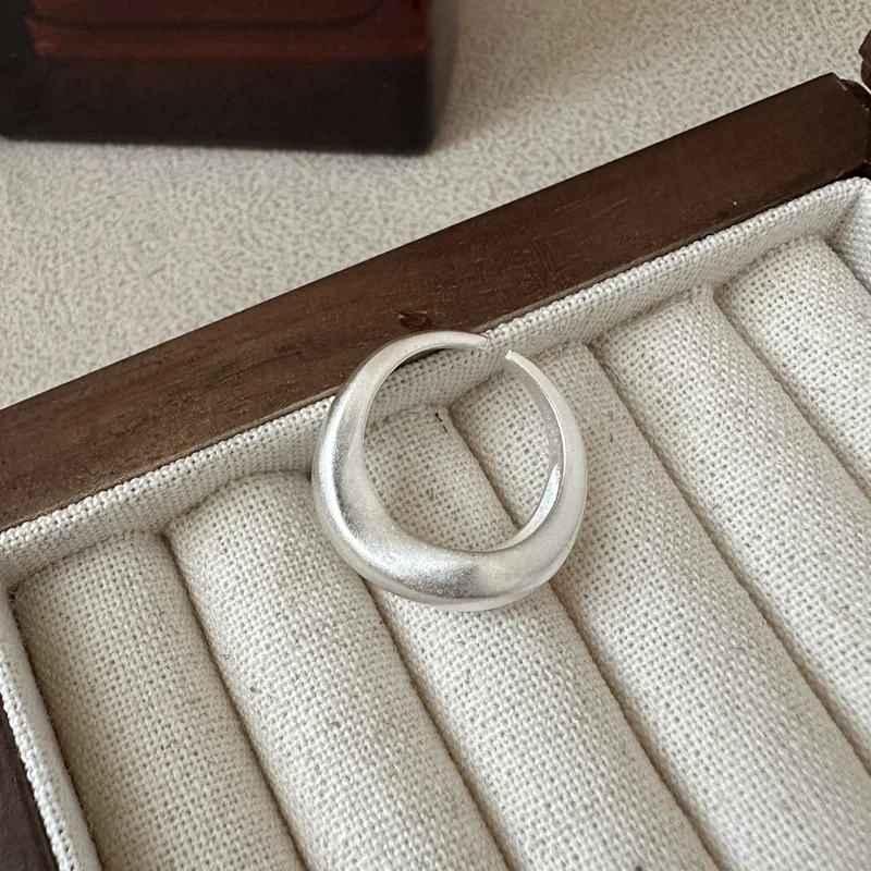 Matte brushed irregular curved sterling silver open ring, minimalist chunky cuff ring display
