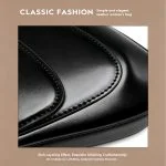 Black genuine leather saddle bag styled as classic fashion accessory, showing structured silhouette with flap closure and silver-tone hardware in editorial styling presentation