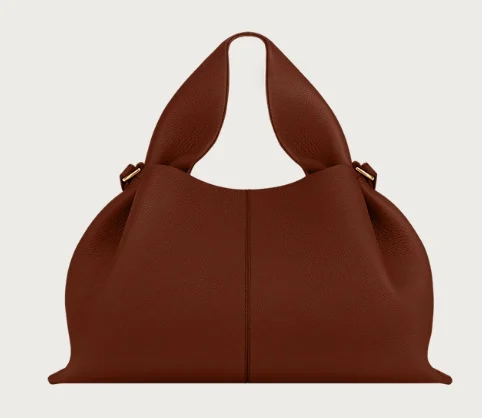 Suede cloud dumpling bag styling shot, vintage soft shoulder bag with casual outfit