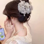 Camellia claw clip with faux pearls detail