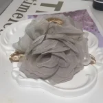 Refined pearl flower hair claw for updos